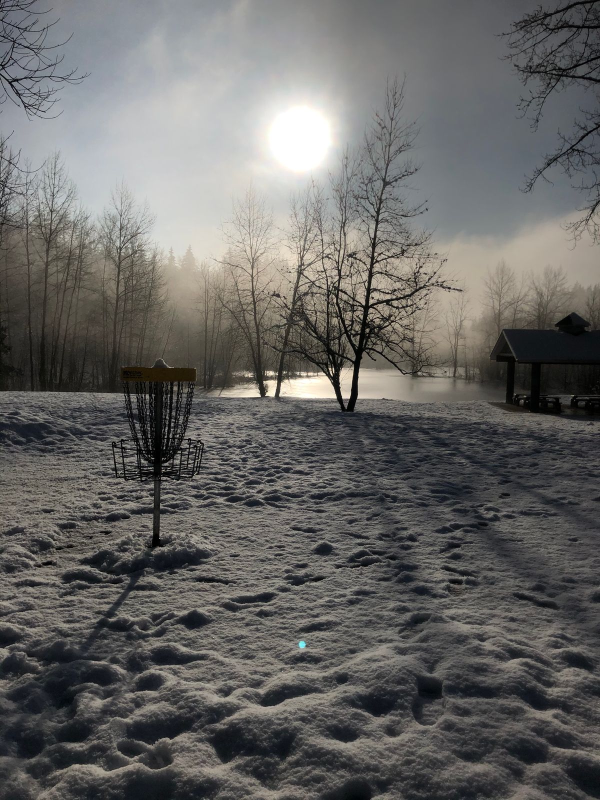 Snowy round at hole 18