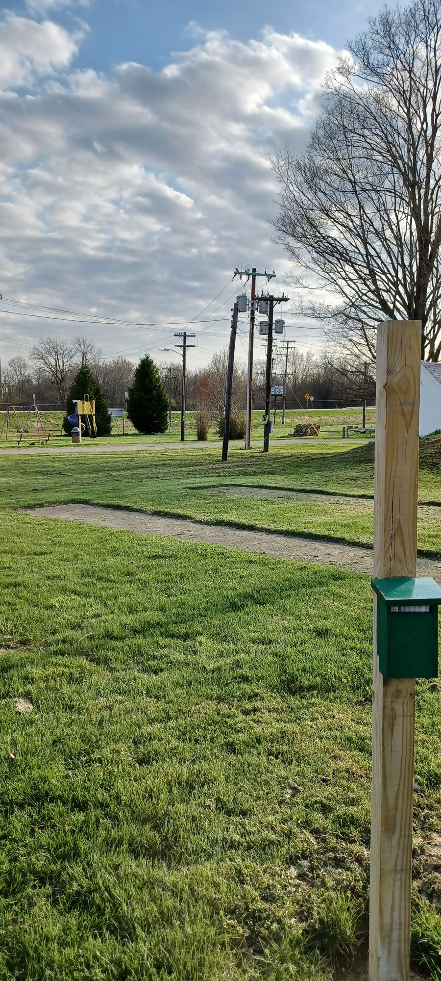 #1 Tee Post with scorecard and map.