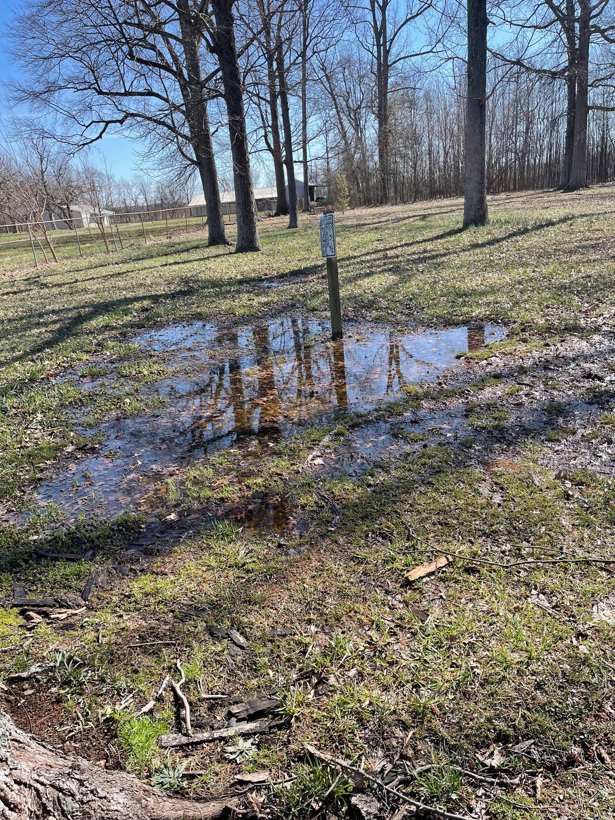Tee pads buried under water