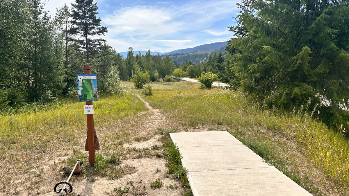 Hole 18 Teepad after a fresh cut. Basket is back left, about 375’.