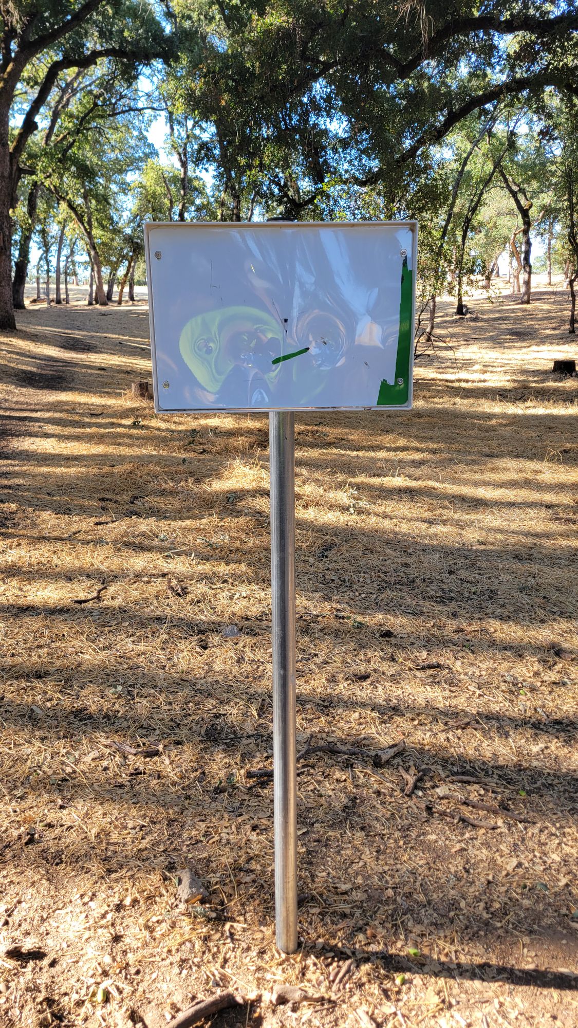 Someone vandalized Hole 2 placard.