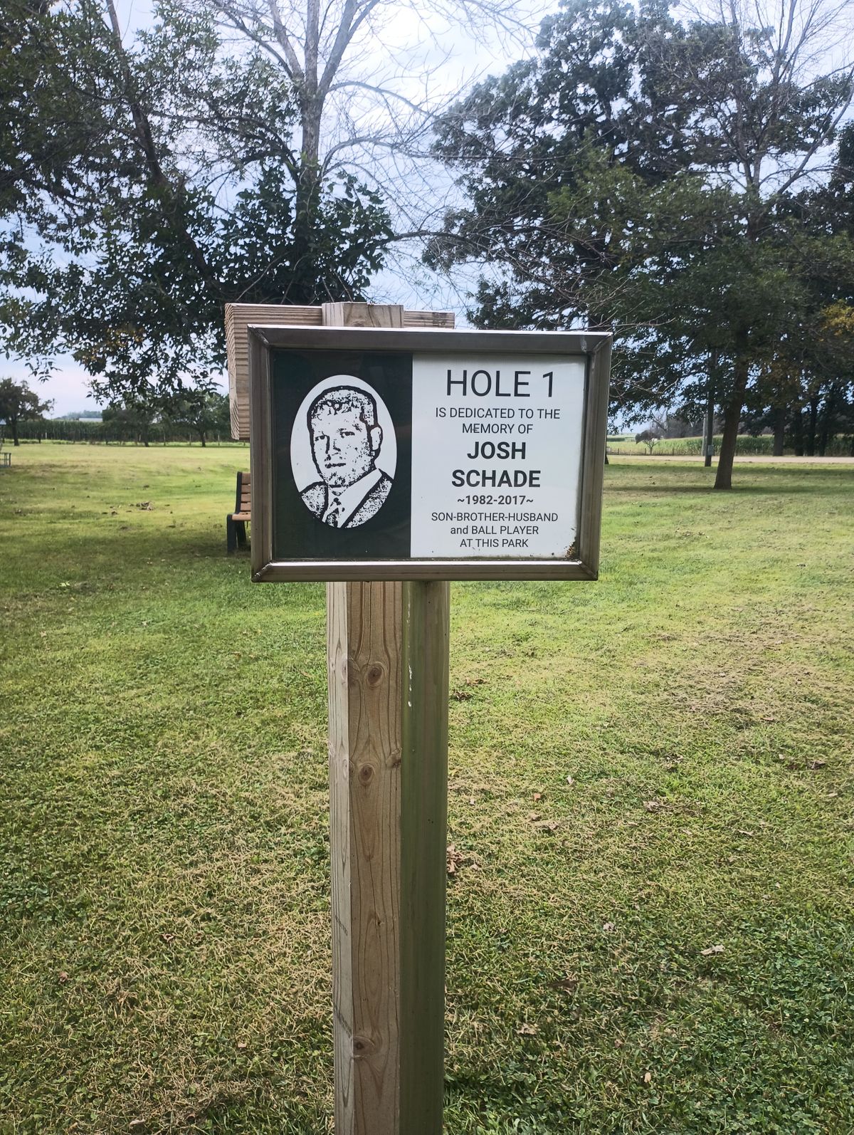 Sign on hole one