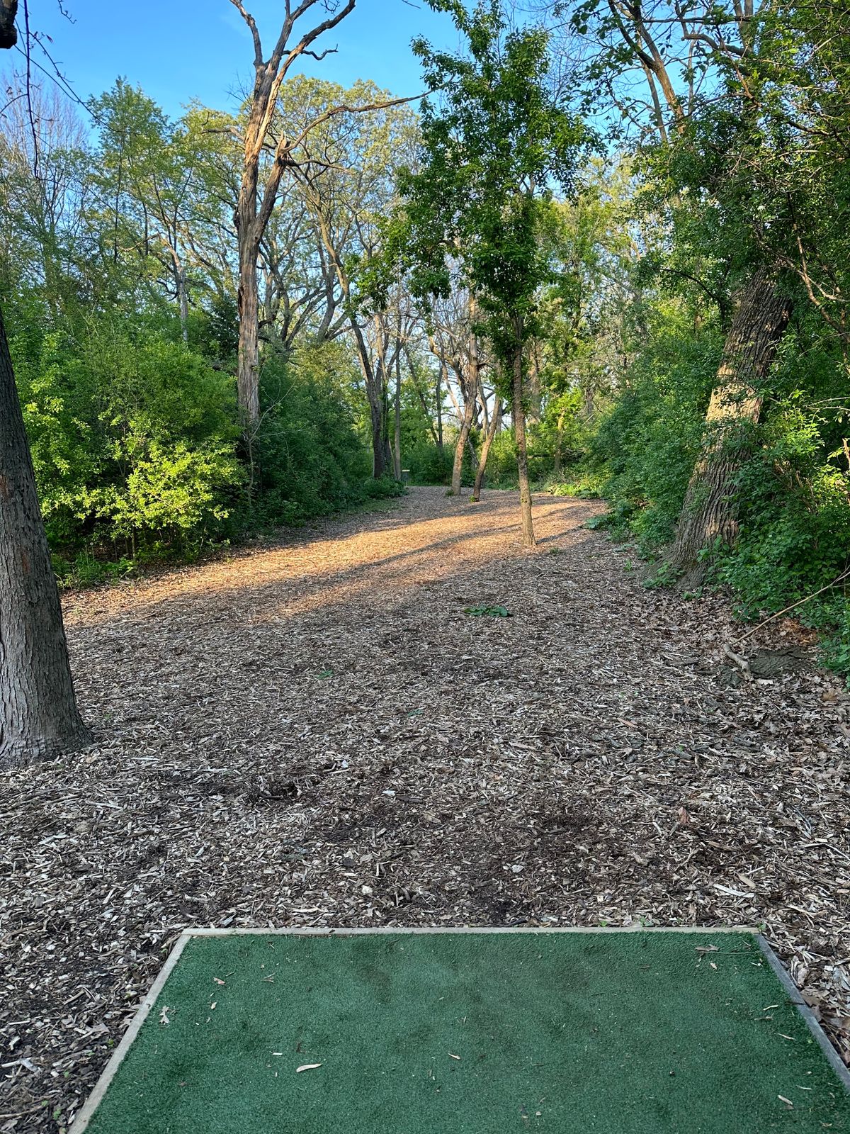 Solid tee boxes or asphalt markings