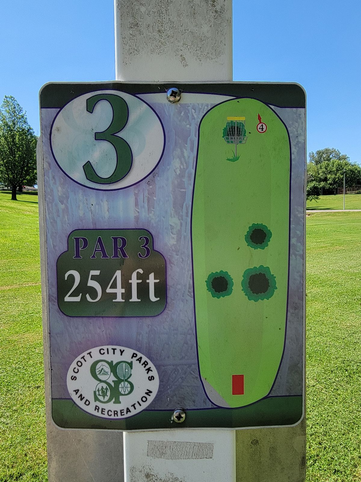 3 tee sign, bottom right tree was removed.