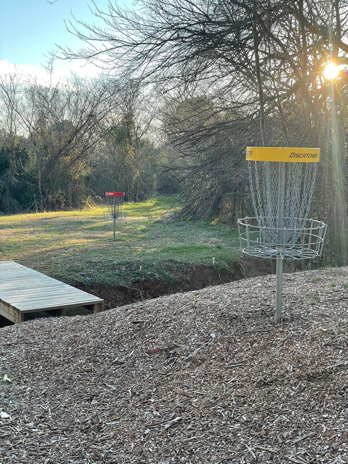 Hole twelve at the short pin showing the short and long pin across the OB creek
