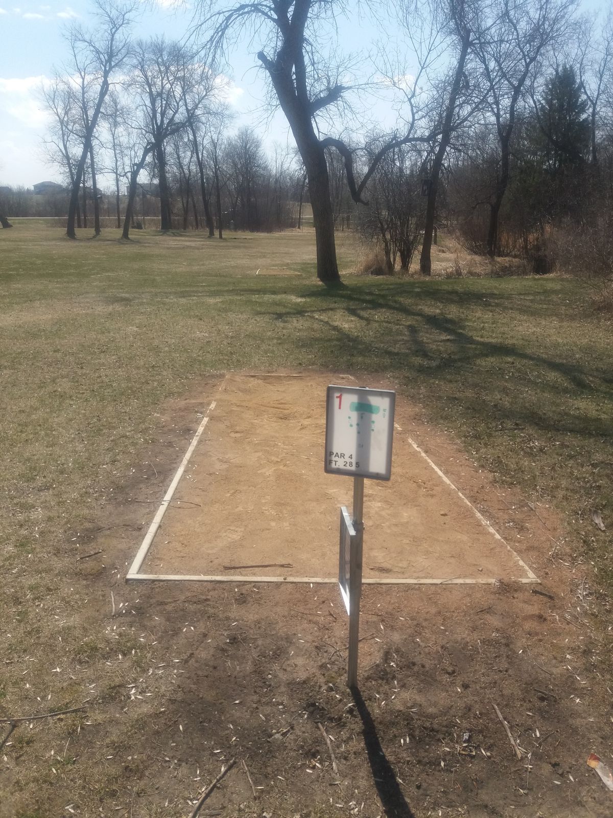 First tee at Lake Charlotte in Long Prairie Minnesota. This is the pro tee and the box to the left is the amateur tee.