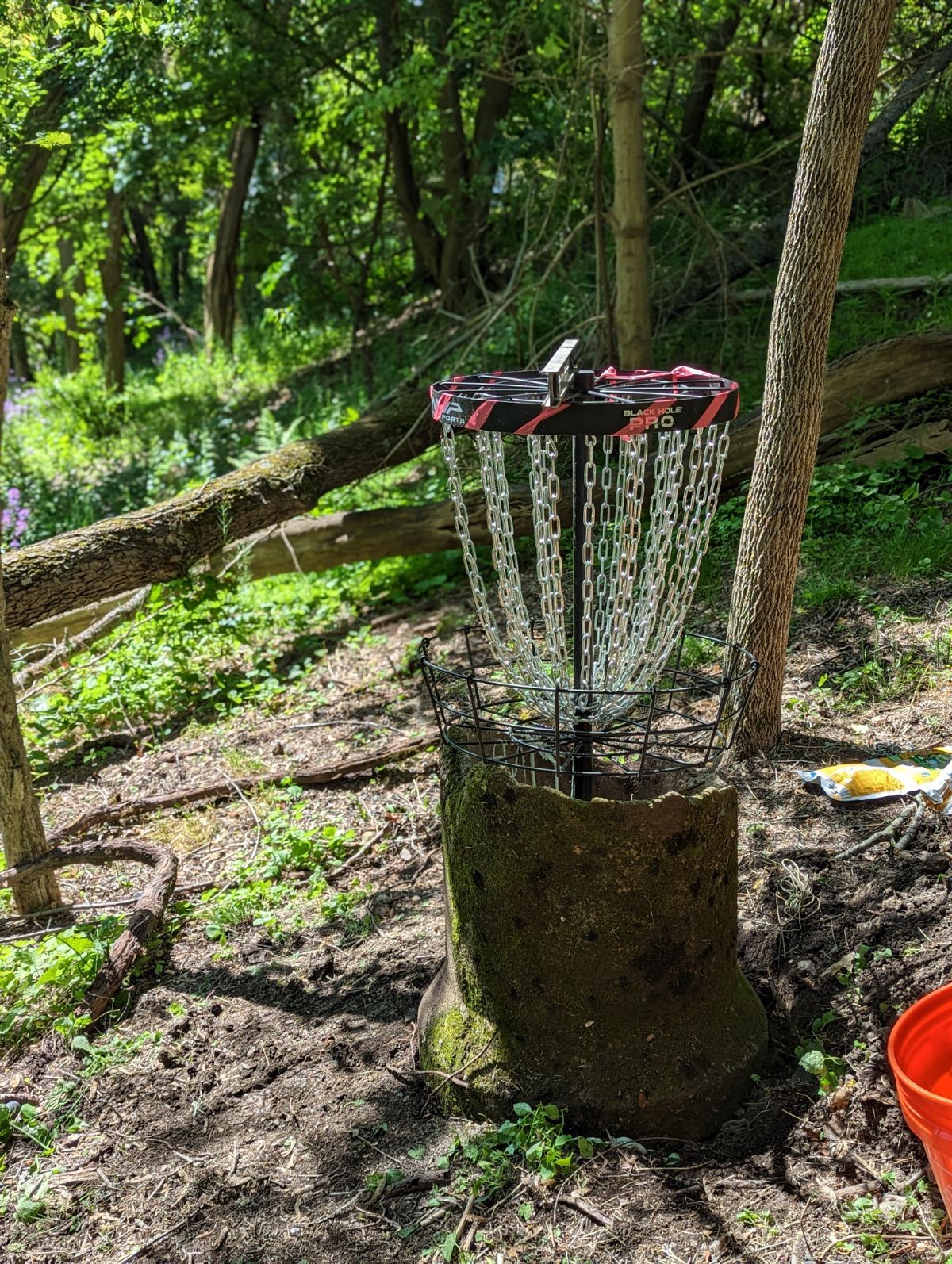 Hole #12 basket repaired after vandalism.
