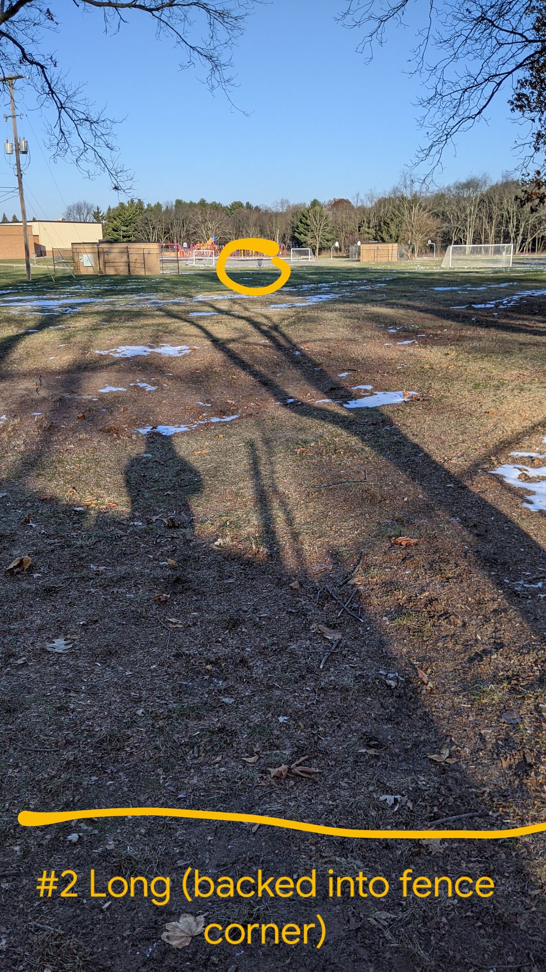 #2 Long Tee - Backed into the corner by backyards to basket by the pump house.