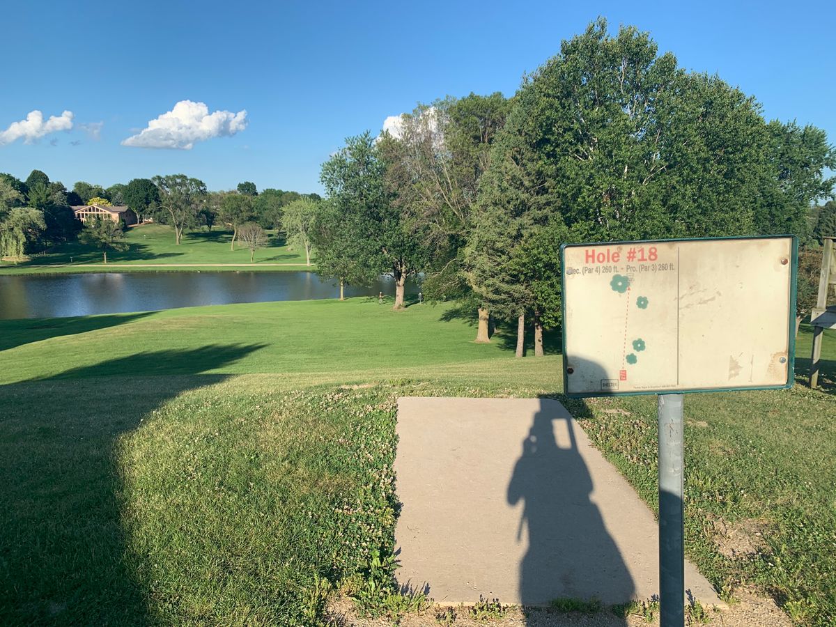 Hole 18 Short A Recreational tee, scenic downhill shot.