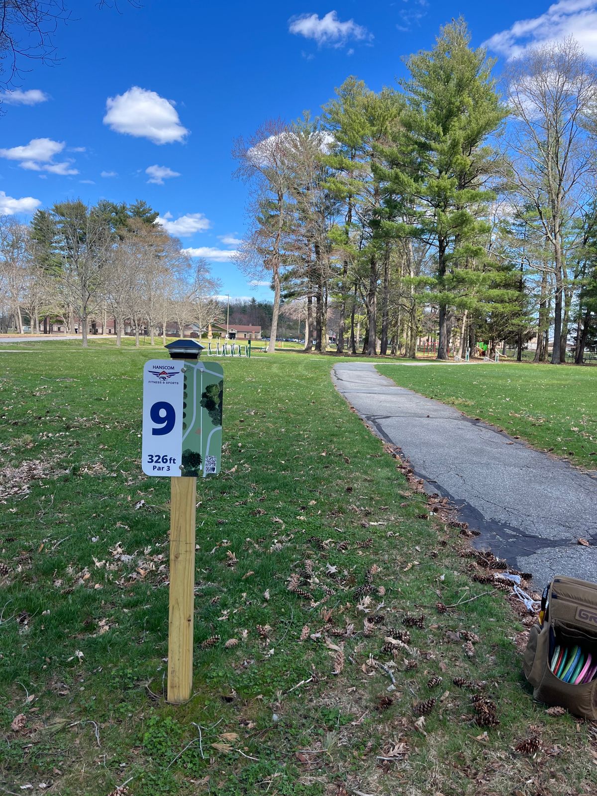 Hole 9, road (can be busy) on left, walkways center and right.