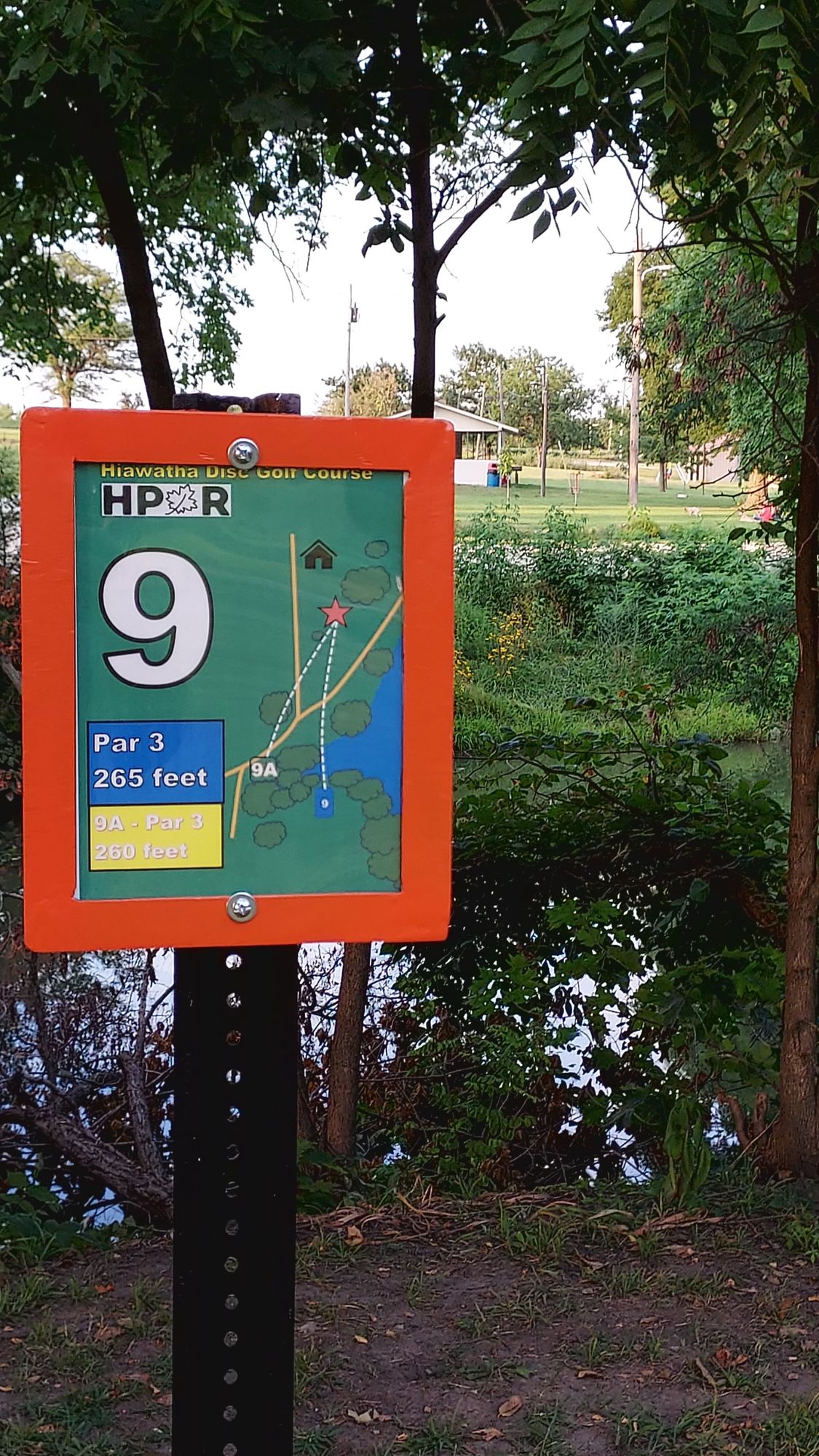 9th tee looking over water to 9th basket.