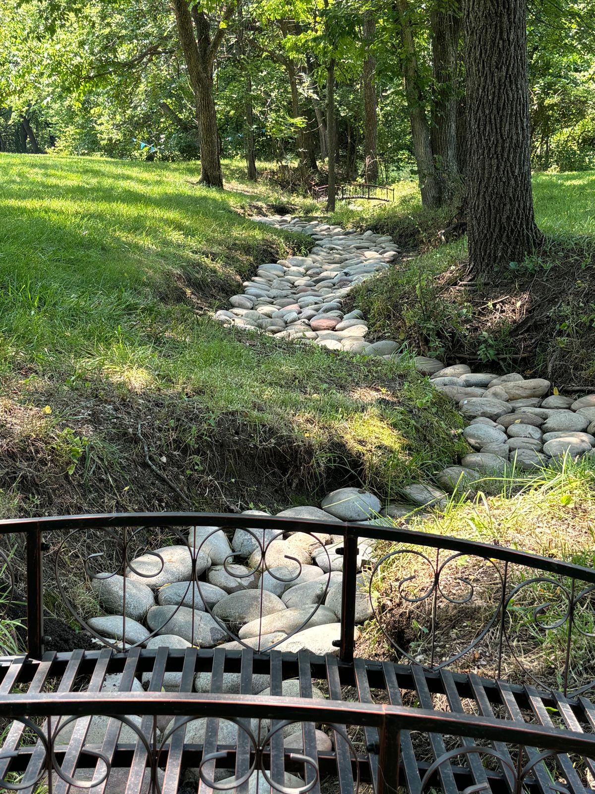 Hidden basket crouching river rock! 
Take me to the bridge !