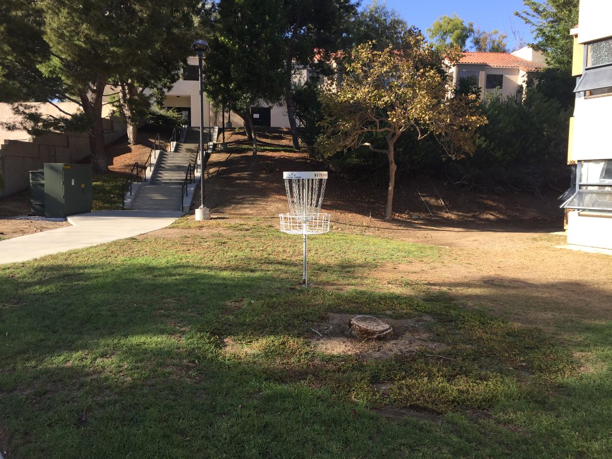 Hole 9 A position next to dorms.