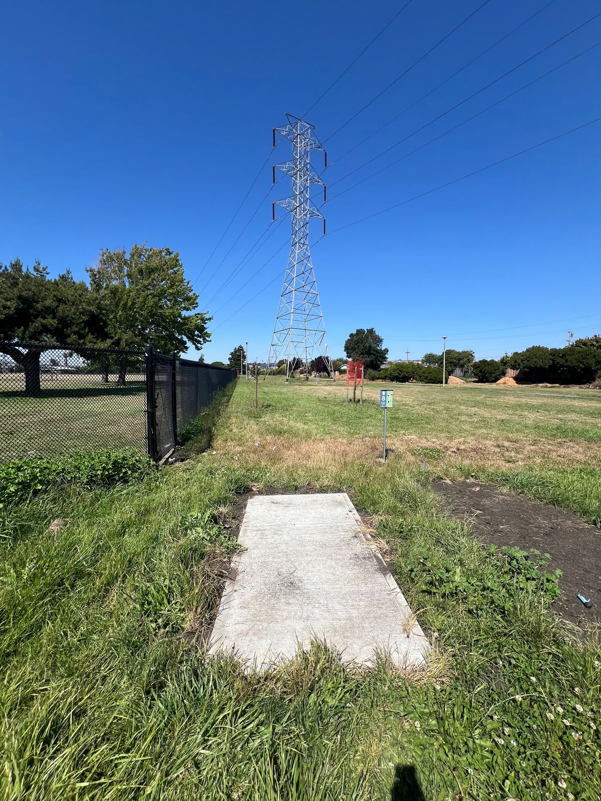 Hole 8 Tee, Fence door opens if you throw over. No need to hop over.