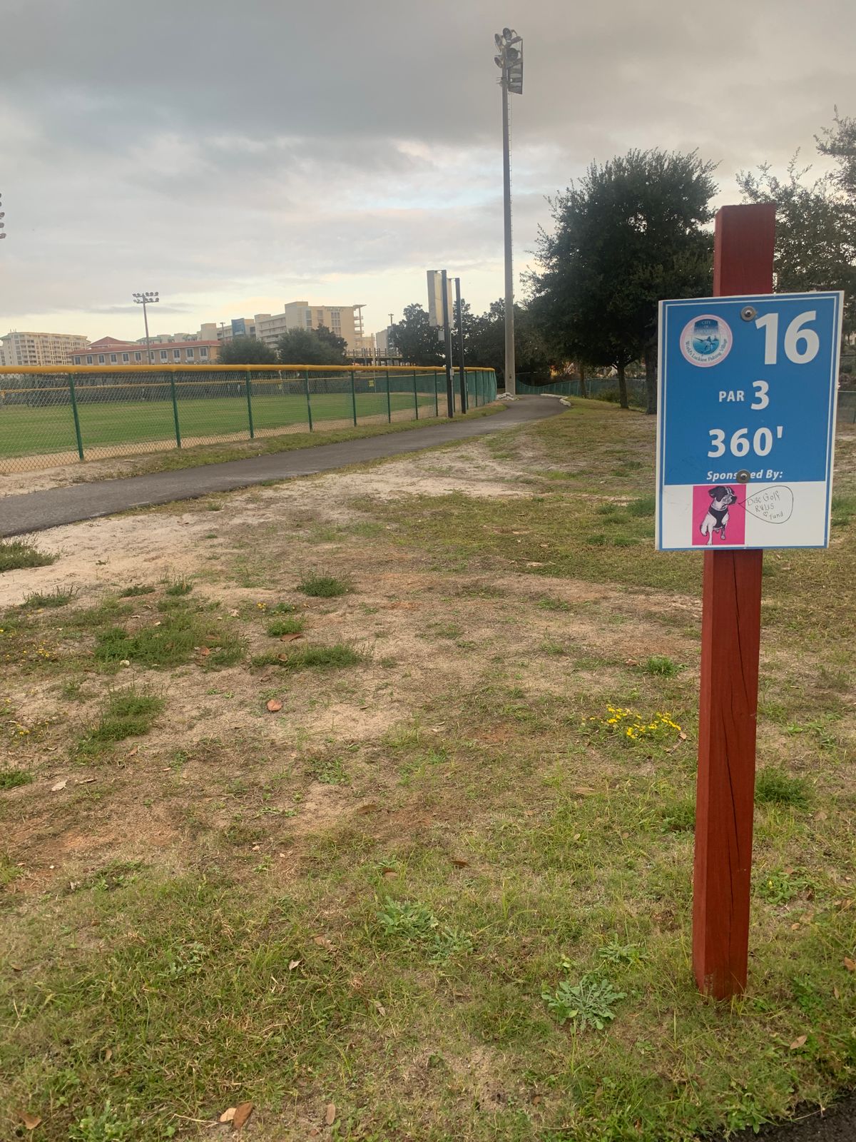 Hole follows fence line and on the right