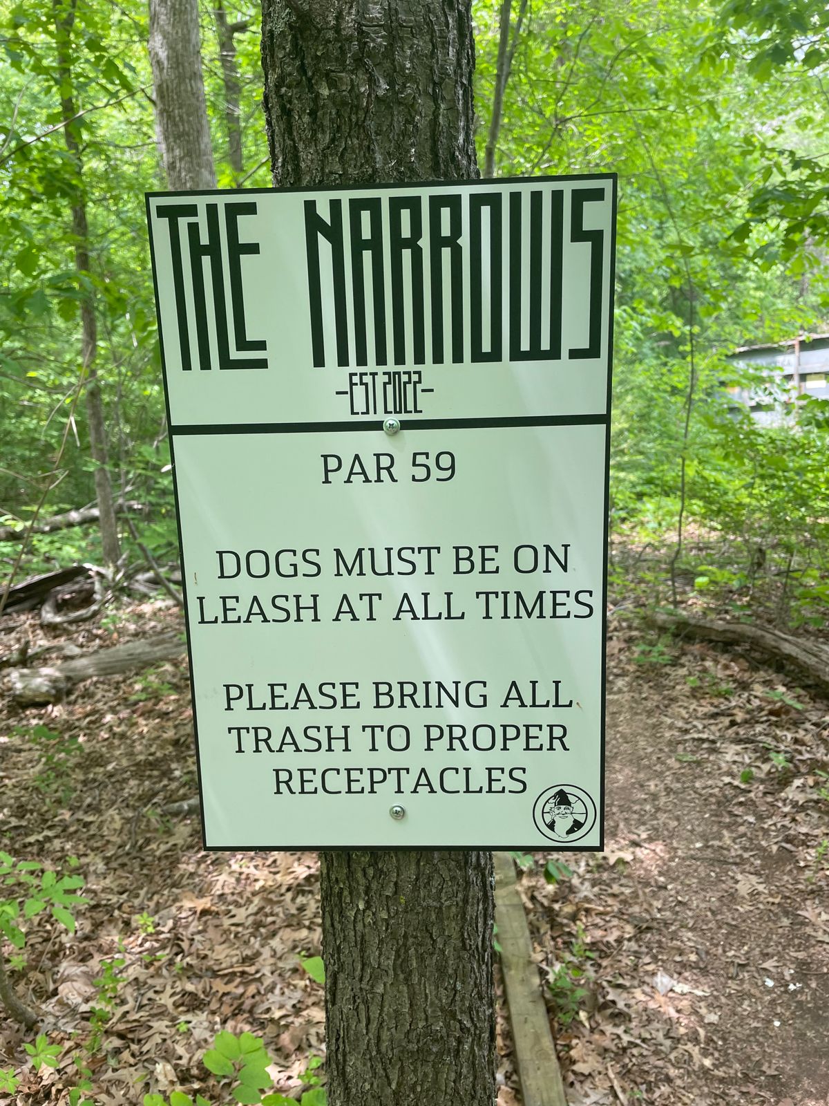 From putting basket at the sinks, walk down the trail toward 17 fairway, go straight across and you