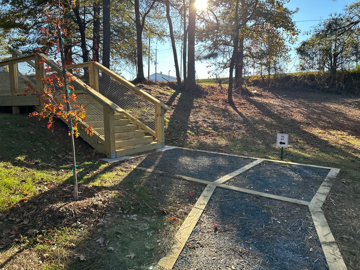 Follow the sign to Tee 1.