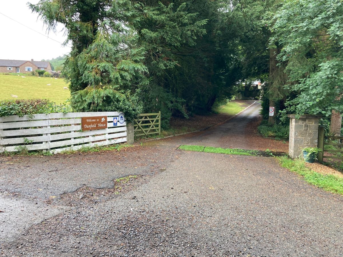 Entrance to Dunfield House. Parking on the left hand side. There is a farm behind (no access).