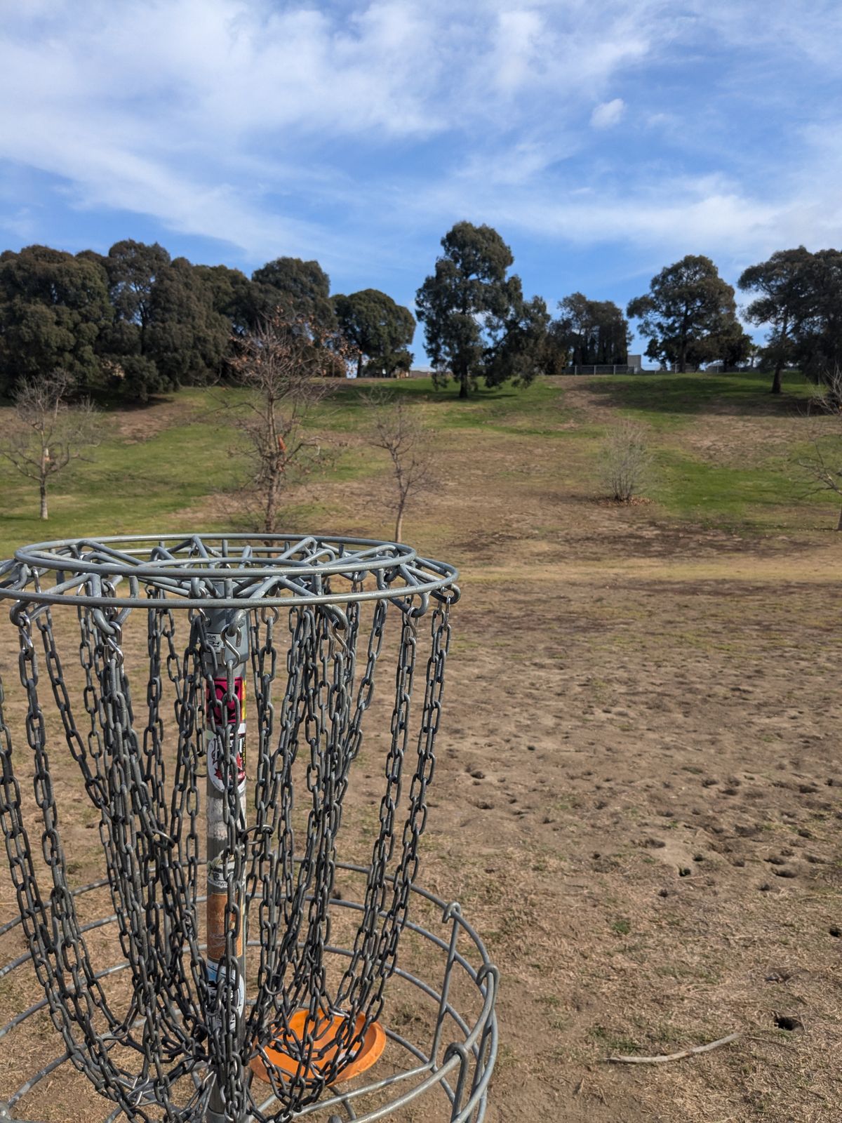 Hole #2 pin looking up toward the "tee" (top of the hill).