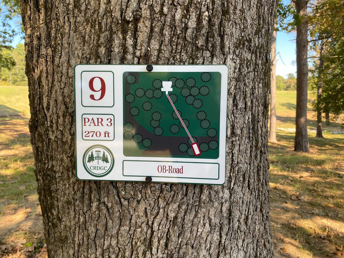 Hole 9 sign (red/white)