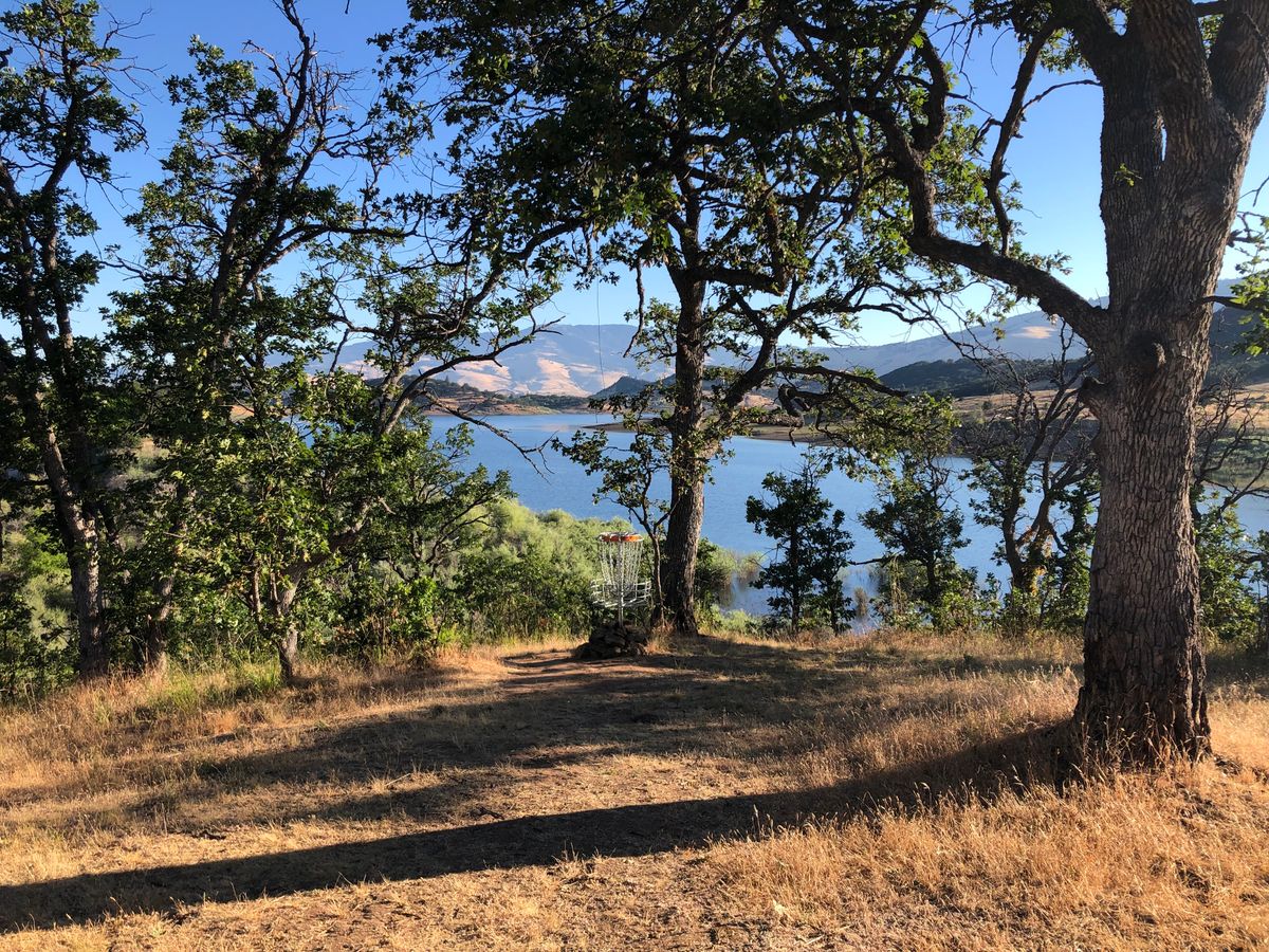 Hole 9 basket with Emigrant Lake