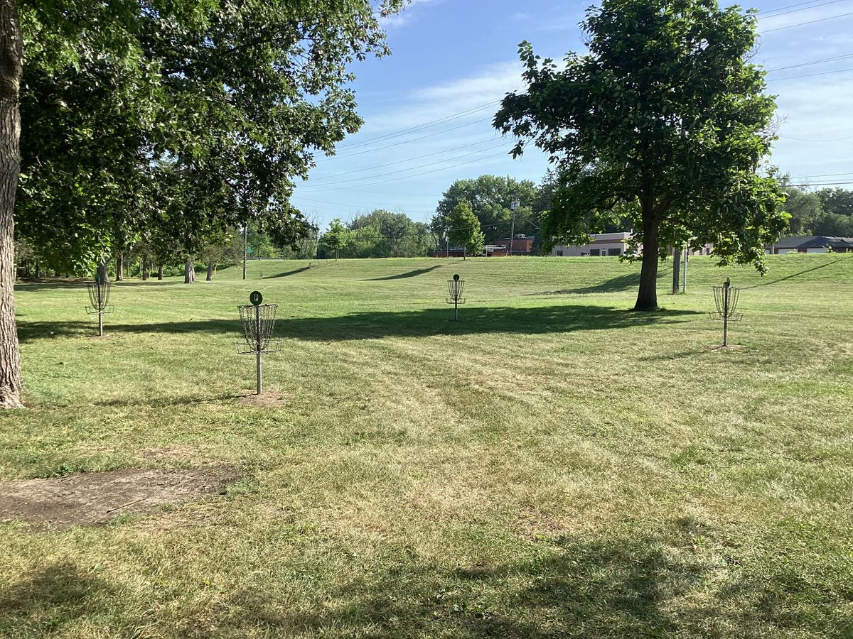Putting green next to shelter. All baskets are approximately circle-one distance apart.