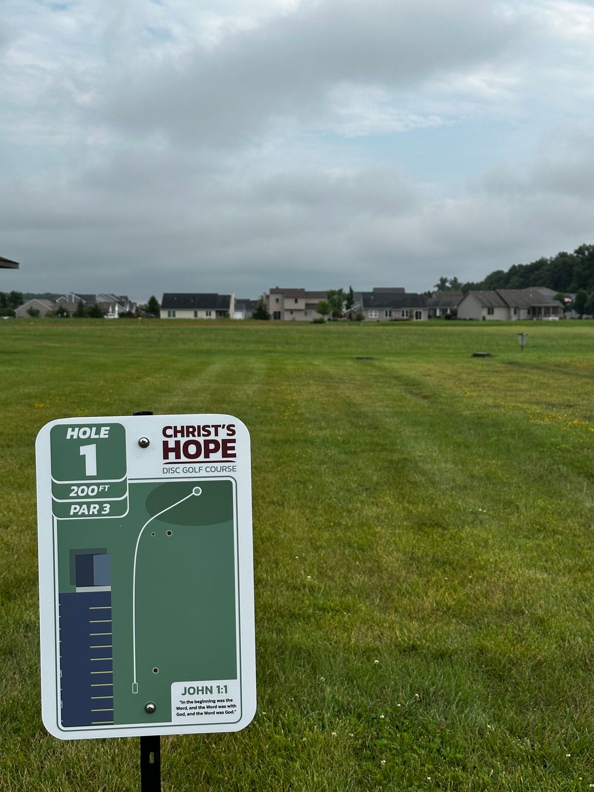 Hole 1 - 200 ft. Par 3. Dog leg right, optional to play manhole cover mandatory.