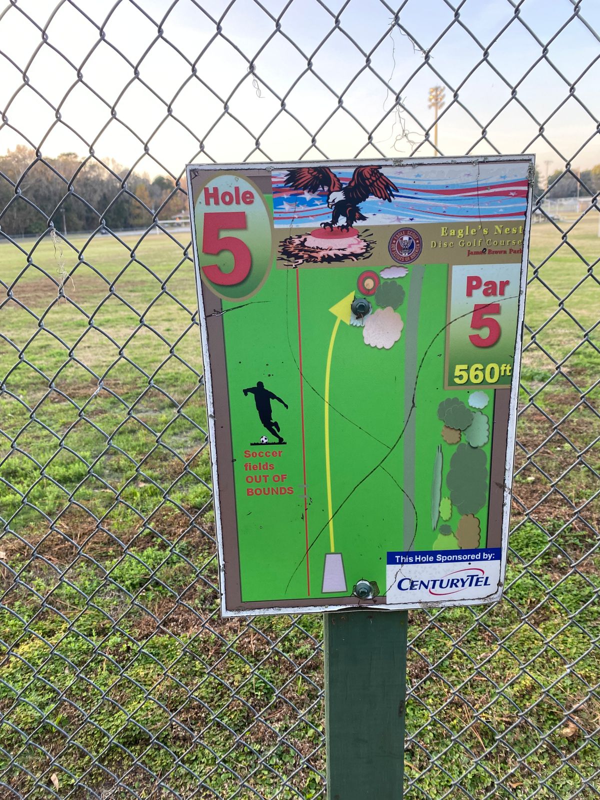 Par 5. Follow the sidewalk and take a left (NOT straight) to get to hole 6.