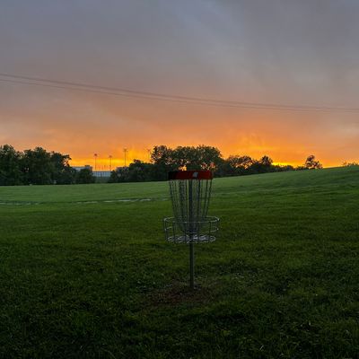 Hole 6 basket at sunset