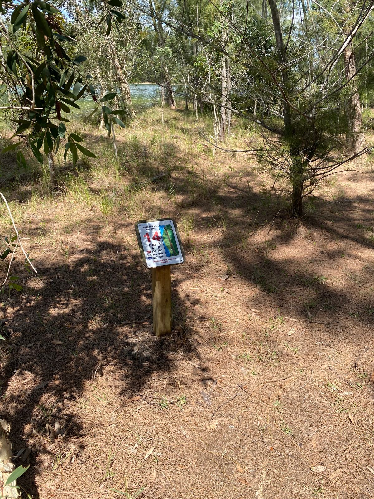 Tee sign at hole 14. Beware of water along left side if your shot goes wide