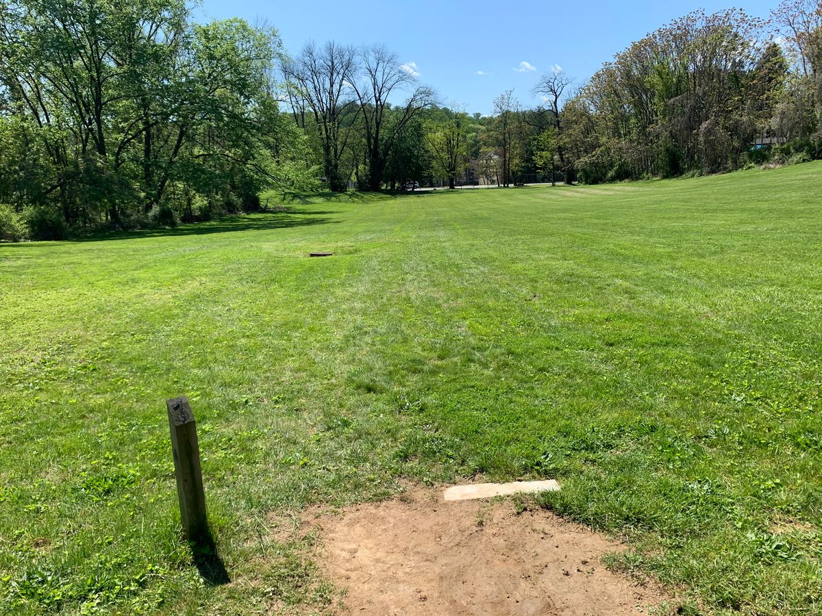 Hole 7 tee. Par 3. Basket is to the left, but before hole 5 tee.