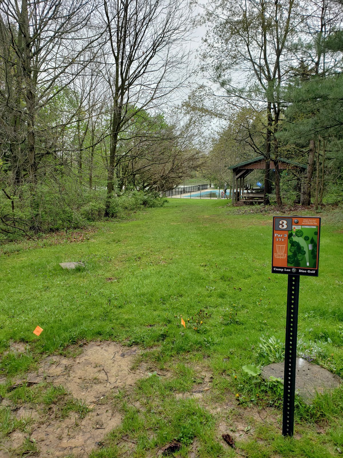 Hole three takes a hard left turn around the brush/trees on the left.  Please use caution if people are swimming, and skip this hole if guests are using the pavilion.