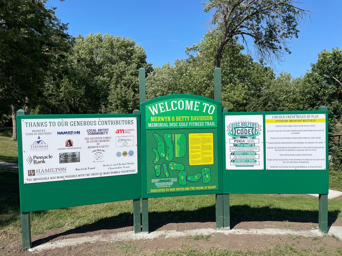 Welcome Board located in Streeter Park. Hole#1 starts behind next to walking trail.
