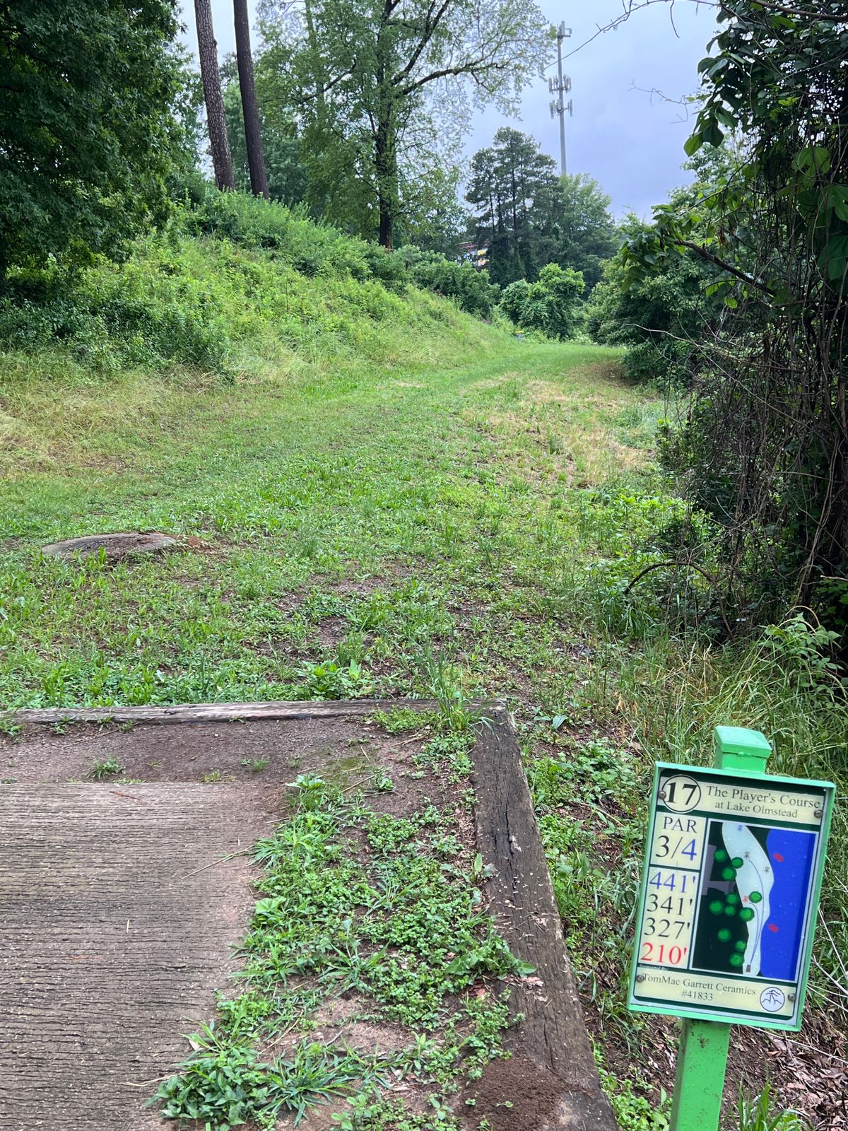 Hole has short red and long yellow basket. 
