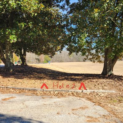 Hole 1. Triple Mando with OB on left and beyond basket.