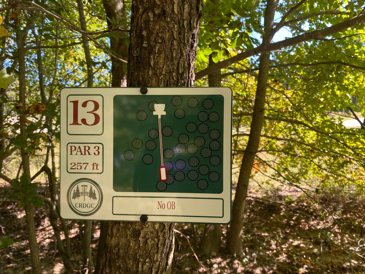 Hole 13 sign (red/white)