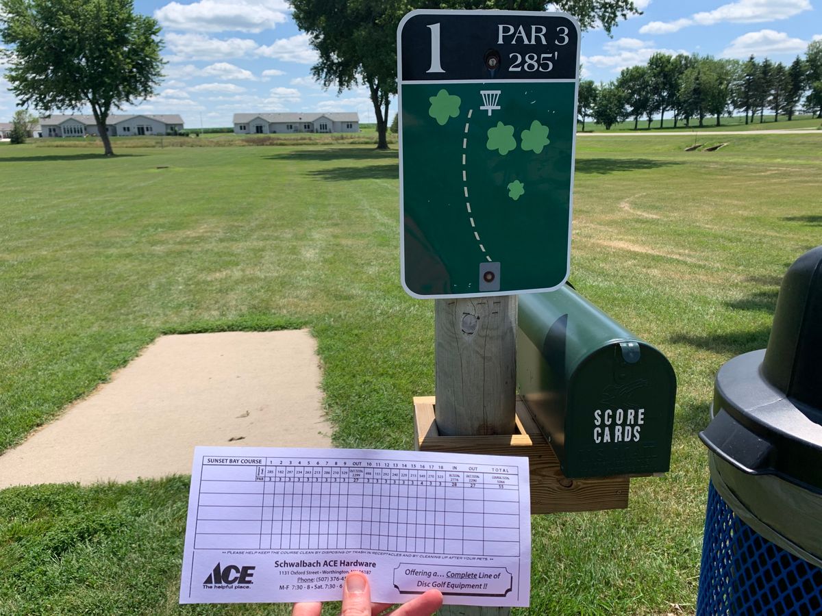 Hole 1 tee pad. Scorecards available in mail box.