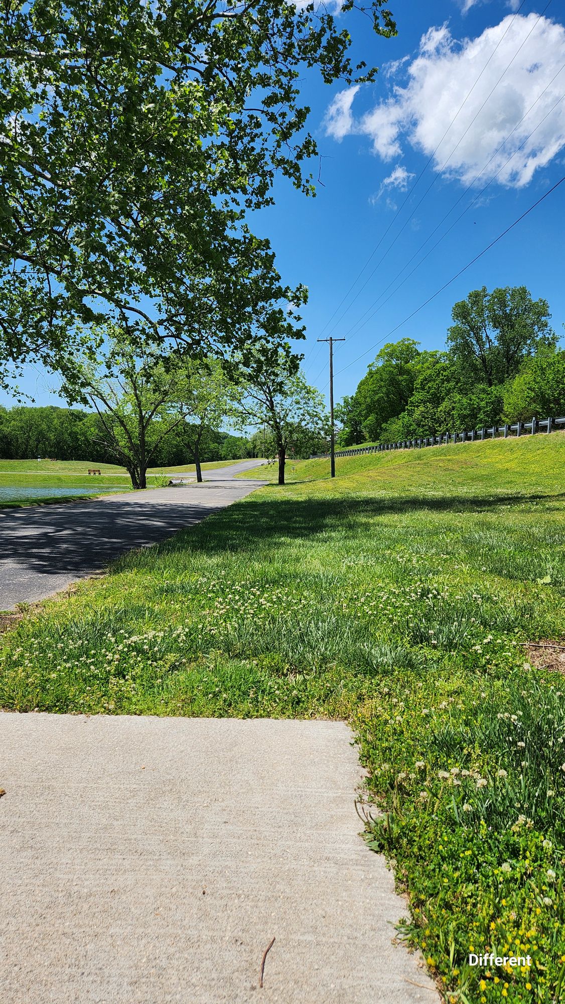 Hole 2, slopes towards OB road, OB drainage ditch past the telephone pole. 