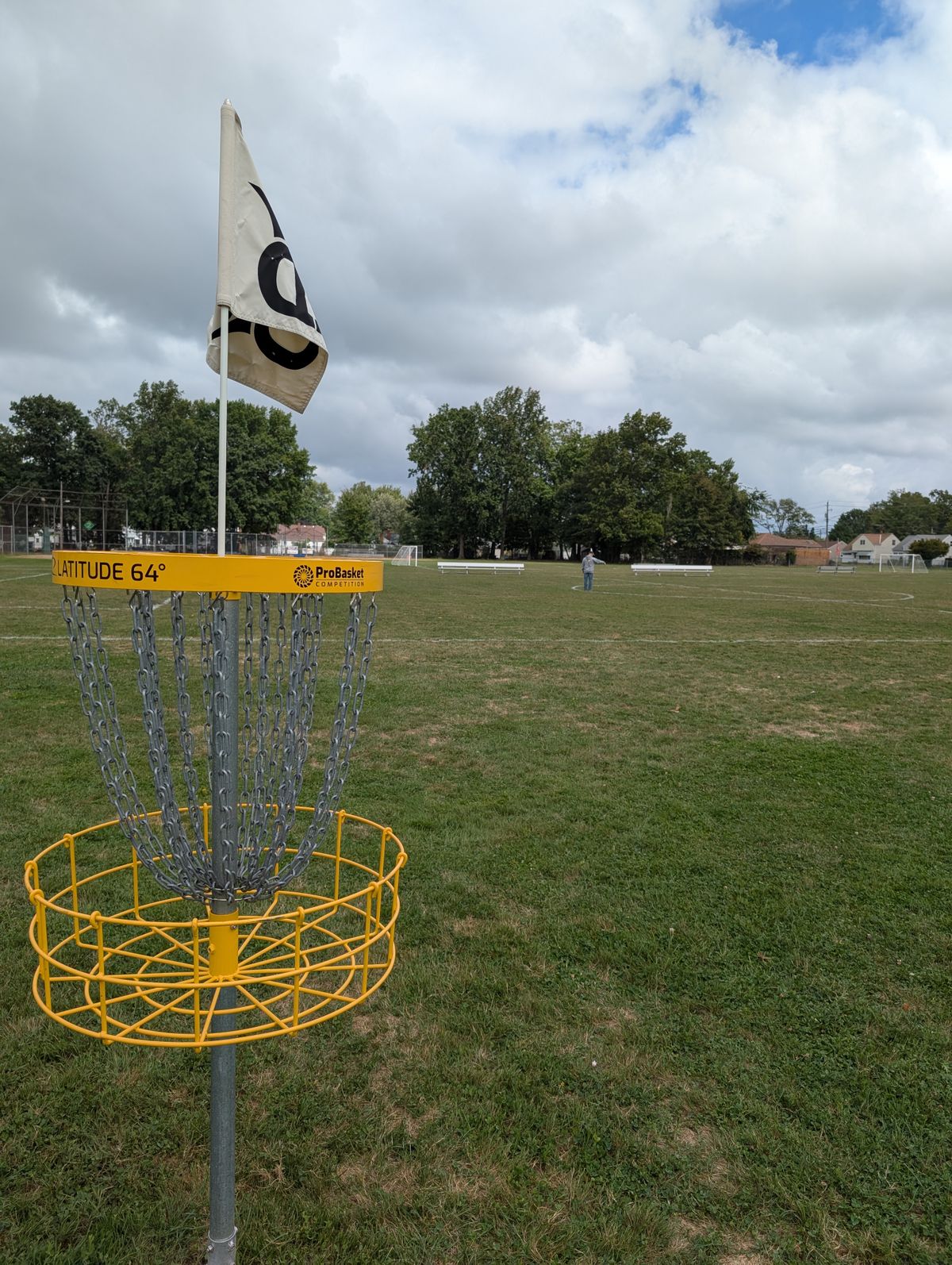 I'm standing at Hole #1 tee in field. View from Practice Basket