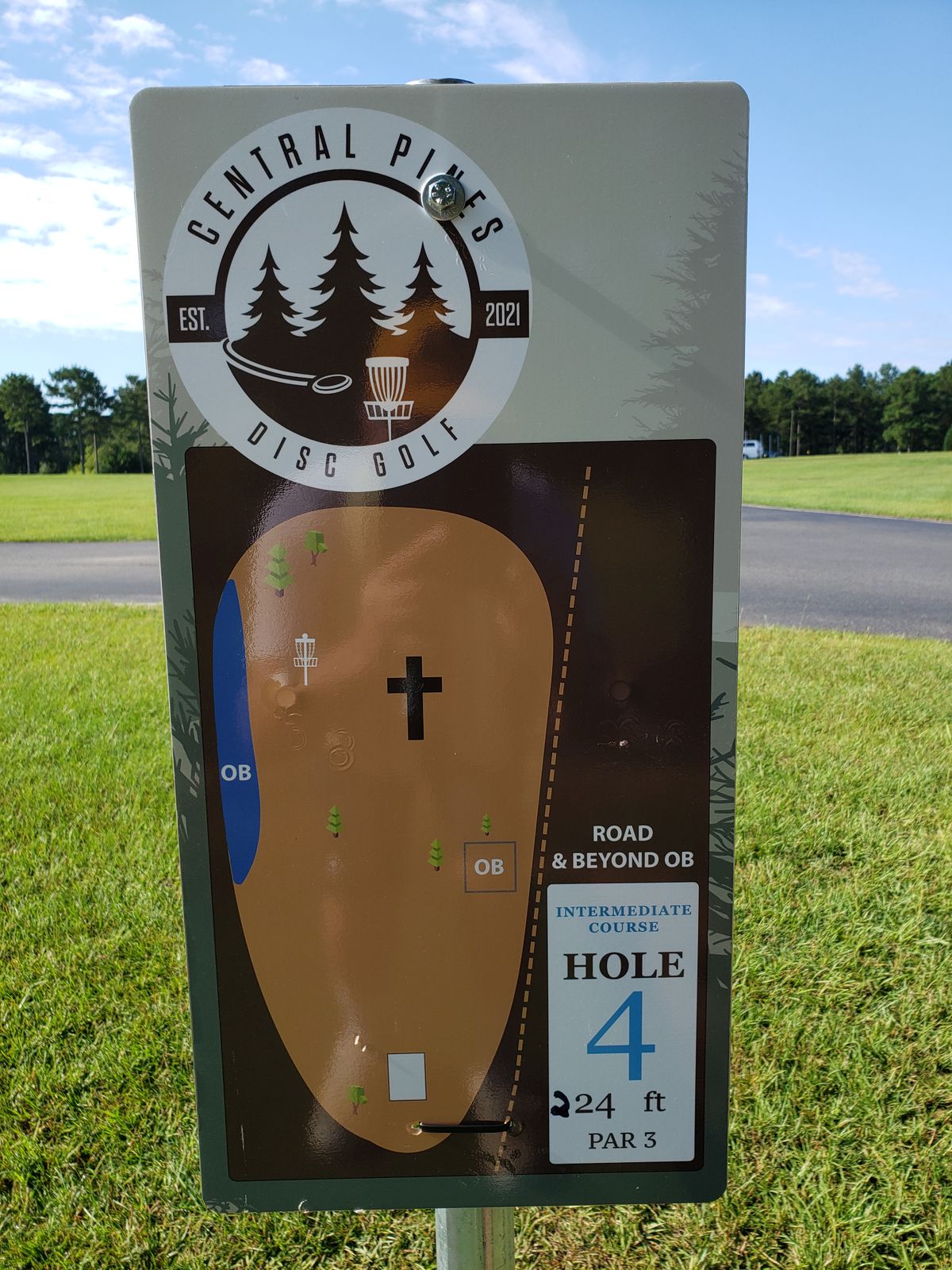 LOOK someone added a 2 , to the #4 Blue Tee Sign!