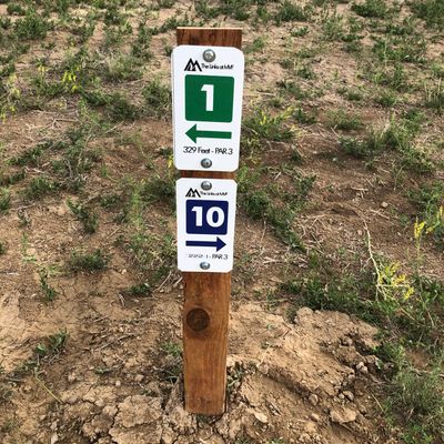 Each hole has a tee post with signs, distances and pars