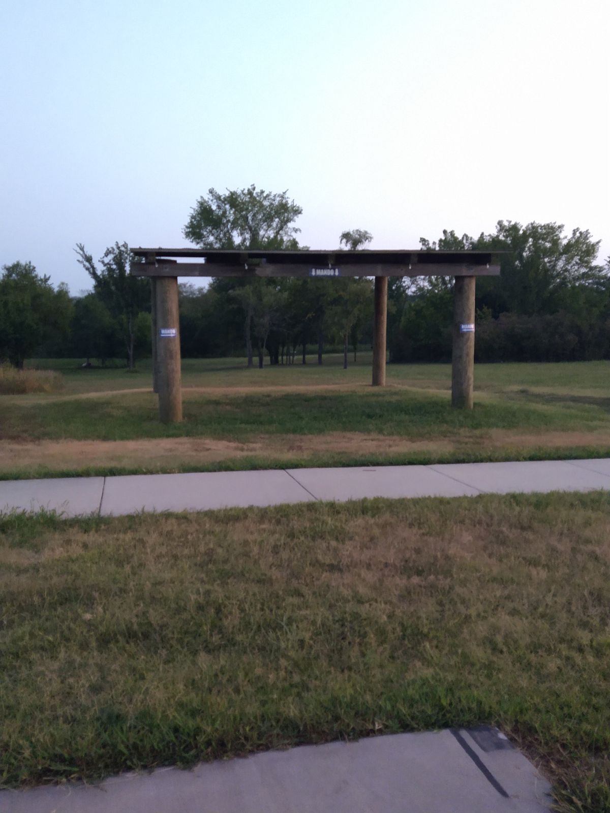 14th Tee near the table, is a triple Mando through the pavilion.