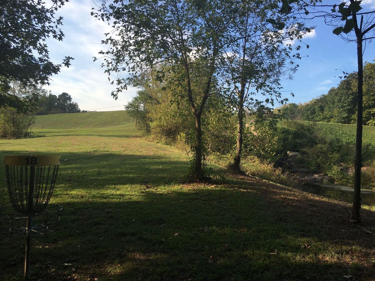 Hole 18 B pin looking up towards the short tee on top of the hill.