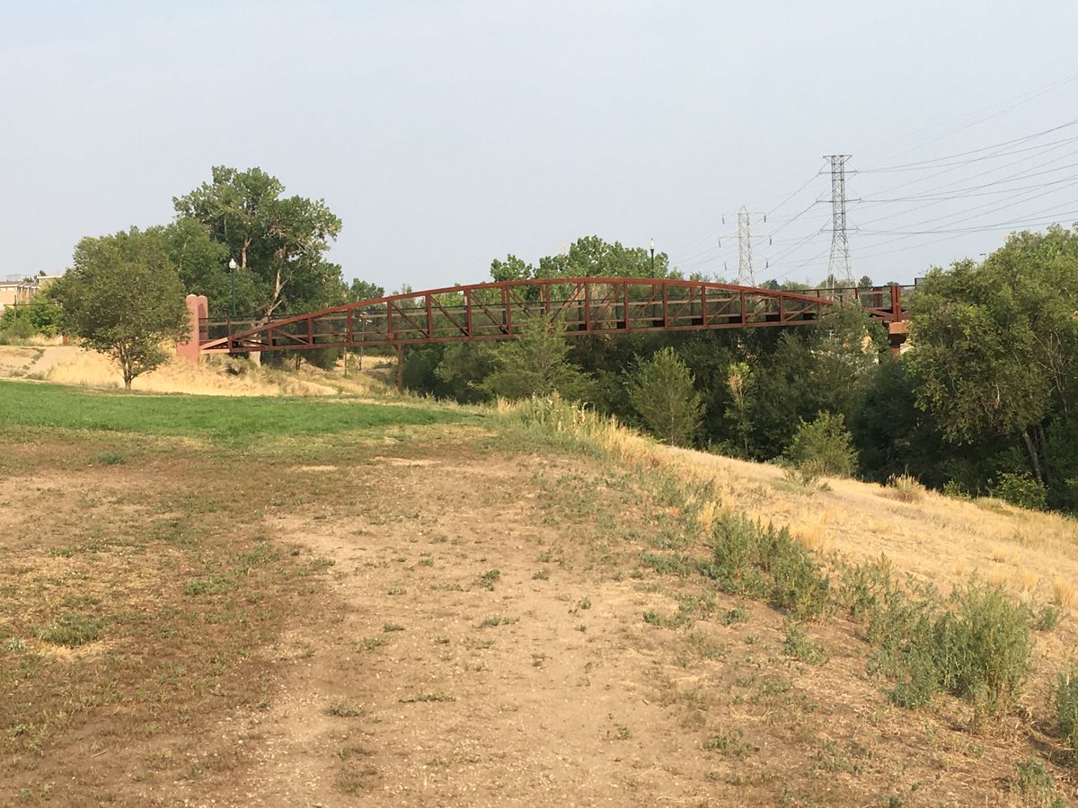 Number 16 is under the bridge with the creek on the right.
