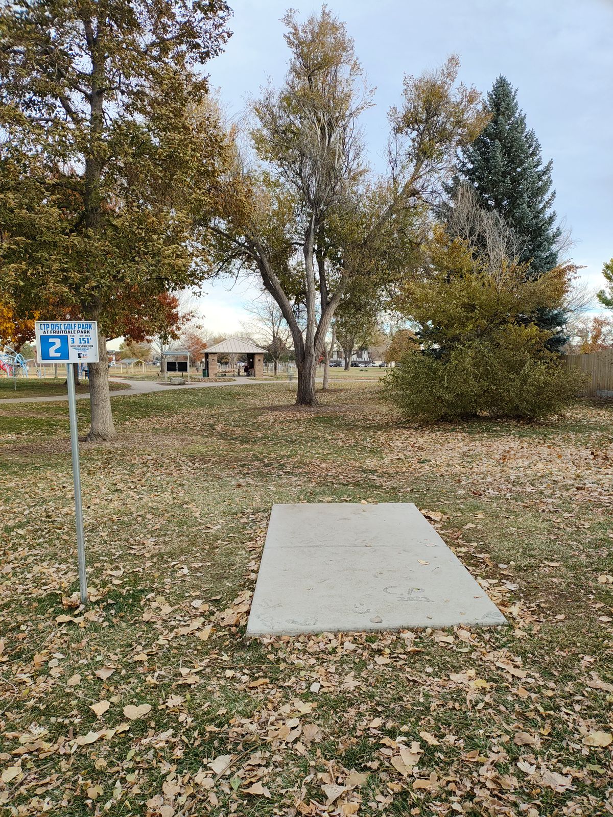 Hole 2 - Mando is right of the tree
