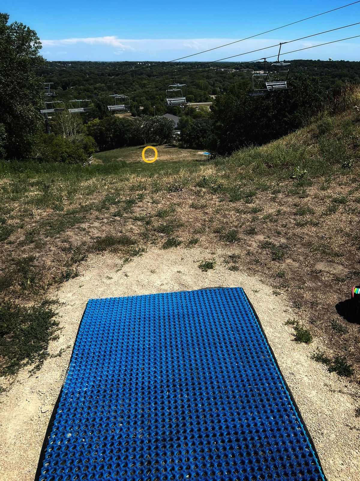 Hole 12 - Consistent tailwind when I was here. Shallow hole with pin at the base of a steep hill.