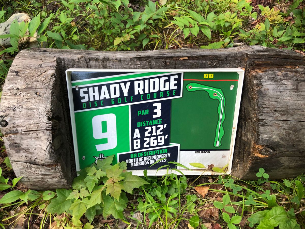 9 Tee sign