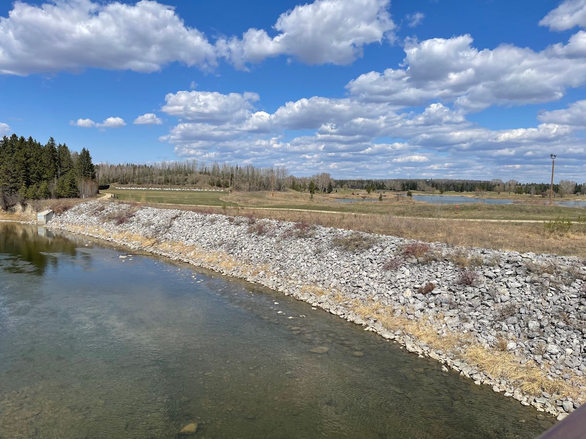 A view of hole 6 from the foot bridge across the reddeer river