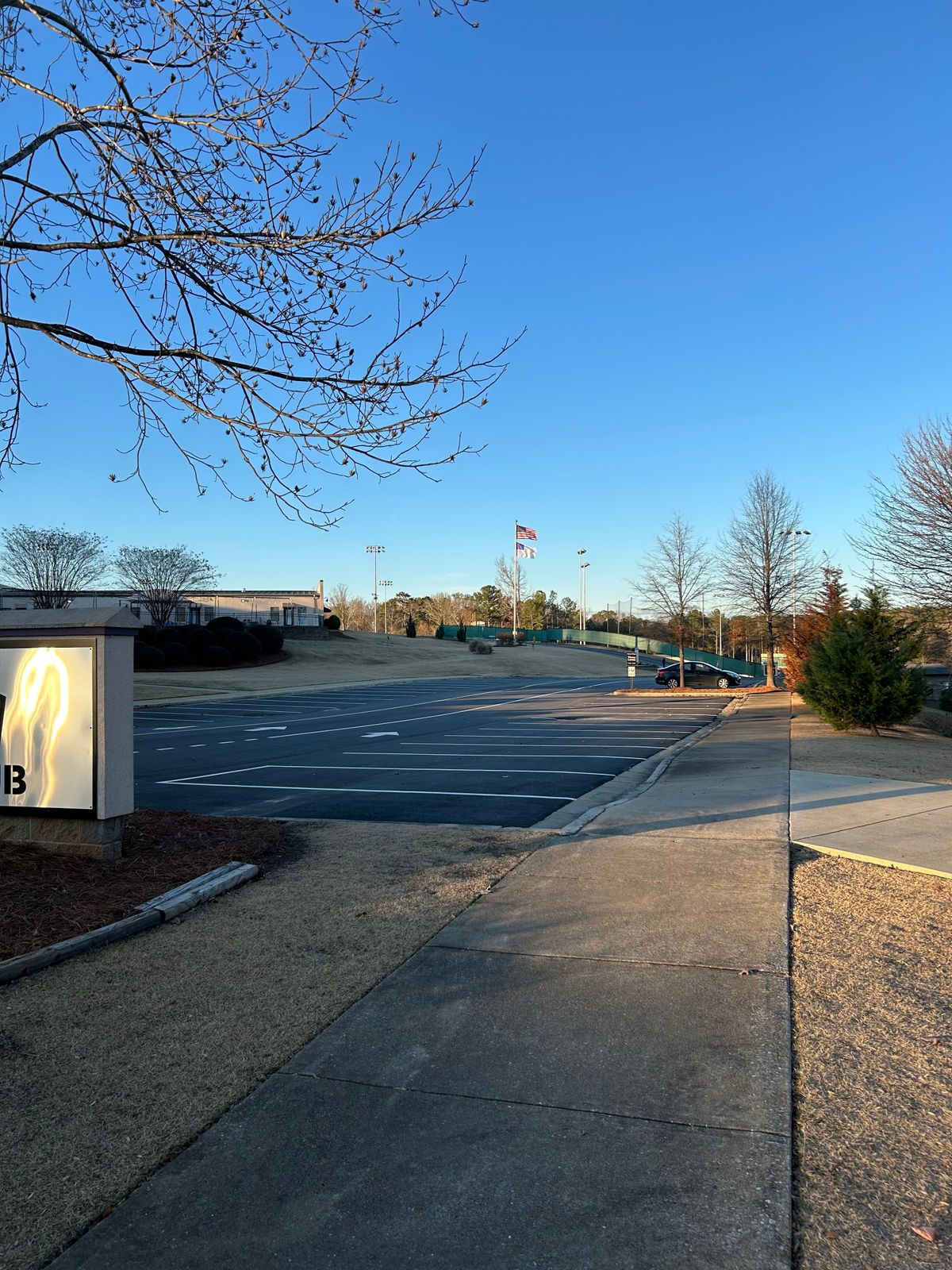 Hole #1 across a parking lot