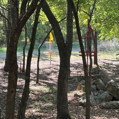 Hole 15 red elevated basket on top of rocks